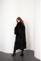 Long sheepskin coat made of natural black cashmere lamb