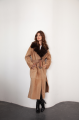 A long brown sheepskin coat with sable fur