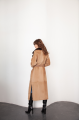 A long brown sheepskin coat with sable fur