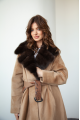 A long brown sheepskin coat with sable fur