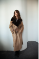 A long brown sheepskin coat with sable fur