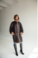 Women's long sheepskin coat of dark chocolate color made of natural sheepskin in VINTAGE style