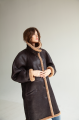 Women's long sheepskin coat of dark chocolate color made of natural sheepskin in VINTAGE style