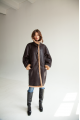 Women's long sheepskin coat of dark chocolate color made of natural sheepskin in VINTAGE style