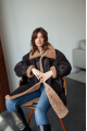 Women's long sheepskin coat of dark chocolate color made of natural sheepskin in VINTAGE style