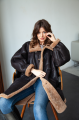 Women's long sheepskin coat of dark chocolate color made of natural sheepskin in VINTAGE style