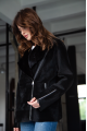 Women's black sheepskin coat made of natural sheepskin with a mink collar