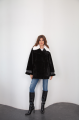 Women's black sheepskin coat made of natural sheepskin with a white mink collar