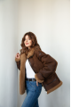 Chocolate-colored women's sheepskin coat made of natural sheepskin in VINTAGE style