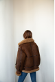 Chocolate-colored women's sheepskin coat made of natural sheepskin in VINTAGE style