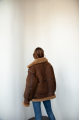 Chocolate-colored women's sheepskin coat made of natural sheepskin in VINTAGE style