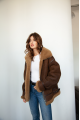 Chocolate-colored women's sheepskin coat made of natural sheepskin in VINTAGE style