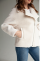 Short women's sheepskin coat made of milk-colored wool