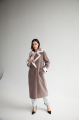 Women's coat of ash-pink color made of ECO fur