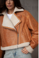 Women's sheepskin coat in whiskey color made of natural sheepskin in VINTAGE style