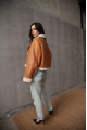 Women's sheepskin coat in whiskey color made of natural sheepskin in VINTAGE style