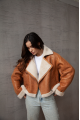 Women's sheepskin coat in whiskey color made of natural sheepskin in VINTAGE style