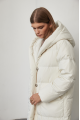 White women's down jacket of beige color with natural filling