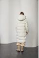 White women's down jacket of beige color with natural filling