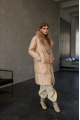 Women's long beige down jacket with fox fur and natural filling