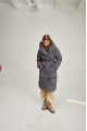 Women's long down jacket of gray color with natural filling