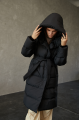 Women's long down jacket of black color with natural filling