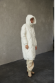 Women's long white down jacket with a hood and natural filling