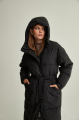 Long women's down jacket of black color with natural filler