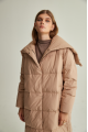 Women's long down jacket of beige color with natural filler