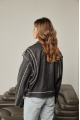 Women's stylish jacket of gray color in VINTAGE style made of genuine leather