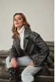 Women's stylish jacket of gray color in VINTAGE style made of genuine leather