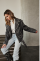 Women's stylish jacket of gray color in VINTAGE style made of genuine leather