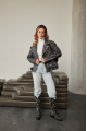 Women's stylish jacket of gray color in VINTAGE style made of genuine leather