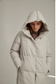 Women's long down jacket of white color with natural filler