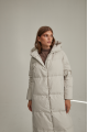 Women's long down jacket of white color with natural filler