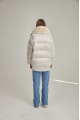 Women's down jacket of white color with fox fur and natural filler