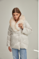 Women's down jacket of white color with fox fur and natural filler