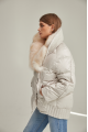 Women's down jacket of white color with fox fur and natural filler