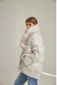 Women's down jacket of white color with fox fur and natural filler