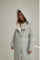 Women's long down jacket in mint color with natural filling