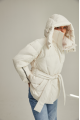 Short women's down jacket of milk color with natural filler