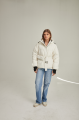 Short down jacket of milk color with natural filler