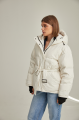 Short down jacket of milk color with natural filler