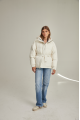 Women's down jacket of milk color with natural filler