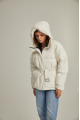 Women's down jacket of milk color with natural filler