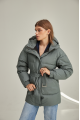 Women's down jacket of green color