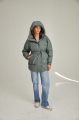 Women's down jacket of green color