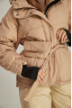 A short caramel-colored down jacket with natural filling