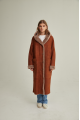 Women's long sheepskin coat of red color made of natural sheepskin