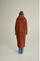 Women's long sheepskin coat of red color made of natural sheepskin